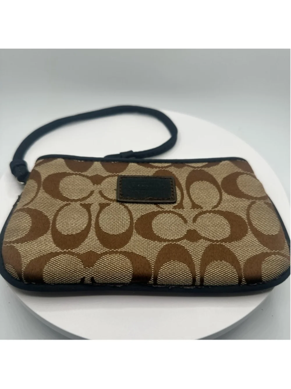COACH TAN AND BROWN SIGNATURE WRISTLET EUC
